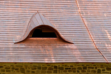 copper roof of an old house © soleg
