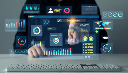 Businessman analyzing digital dashboard with financial charts, KPI, global data, and graphs on virtual screen interface. Modern analytics and data visualization concept.	
