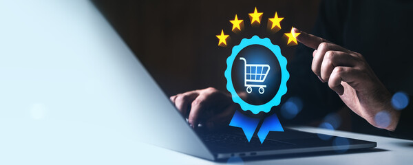 Online shopping quality assurance concept with five star rating and blue badge icon over laptop screen on dark background showing user satisfaction..