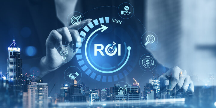 Businessman interacting with ROI interface showing return on investment concept with futuristic graphics and cityscape background at night time. - Powered by Adobe
