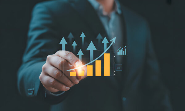 Ascending Analytics: A Business professional charts the course for future success, pointing towards rising graphs and upward-bound arrows, signifying growth and progress.