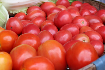 Ripe tomatoes in a fresh vegetable shop