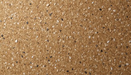 Detailed brown surface showing a textured pattern of small pebbles and granules creating a rough, organic background