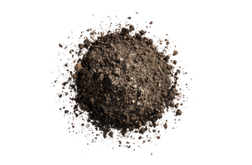 A spherical clump of dark brown soil, surrounded by a scattering of small, colorful particles