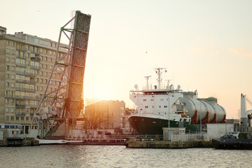 LNG Tanks Transportation On Deck Of Heavy-Lift Vessel, Heavy Load Carrier Entering The Basin Through The Lock © I am from Mykolayiv