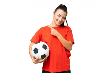 Young beauty woman over isolated chroma key background with soccer ball and pointing to the lateral