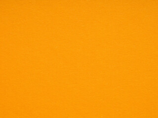 Warm marigold paper texture stirs a joyful energy, inviting bold creativity and cheerful thoughts