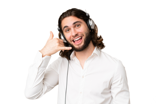 Telemarketer man working with a headset over isolated chroma key background making phone gesture. Call me back sign