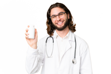 Young handsome man over isolated chroma key background wearing a doctor gown and holding pills