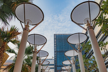 Modern Middle Eastern architecture. Unique building design in Masdar City. View: City lighting