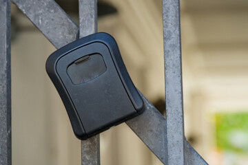 Plastic Key Safe Attached to Metal Fence Panel in copenhagen cph