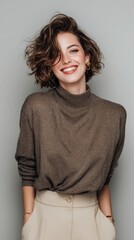 Studio Portrait of a young woman, soft natural lightning, casual outfit, light grey background, realistic photograph