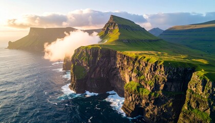 Majestic coastal cliffs with ocean waves at sunrise