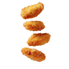 Multiple crispy chicken nuggets are suspended in midair with visible texture and golden brown color on an isolated white or transparent backdrop