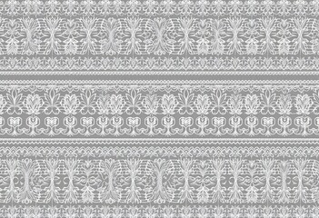 Horizontally repeating gray lace pattern with delicate matching borders, embroidery, elegant