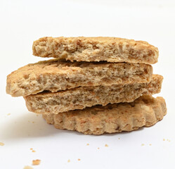 broken integral cookies on white background
