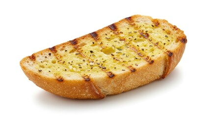 Close-up of a golden-brown, grilled garlic bread slice, showcasing grill marks and seasoning.