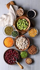 Assortment of spices in white bowls on a black background.