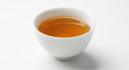 Elegant White Bowl Filled with Amber Liquid on White Background