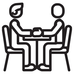 Two people sitting at a table talking business meeting discussion