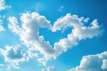 heart shape clouds on blue clear sky.