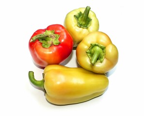 juicy sweet ripe pepper. Bright red and green sweet pepper in a heap vegetable for salad and stew, full of vitamins on a white background
