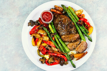 Roasted duck breast with vegetables.