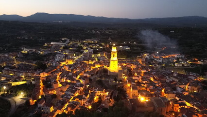 spanish medieval town by night with medieval tower