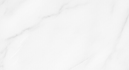 Obraz premium A smooth, polished white marble slab with delicate grey veining creating an elegant textured background.
