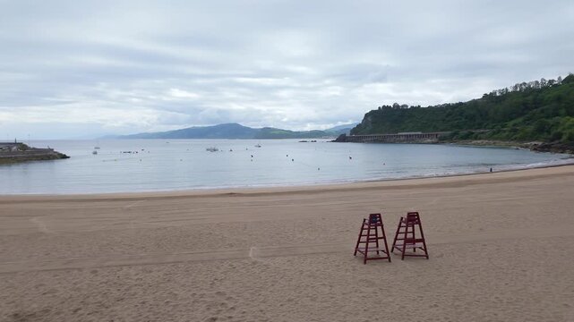 Large beach in the town of Getaria on the edge of the sea in northern Spain, Basque Country.