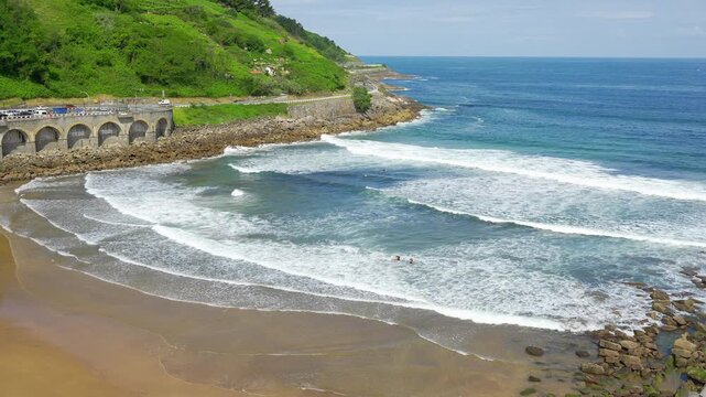 Large beach in the town of Getaria on the edge of the sea in northern Spain, Basque Country.
