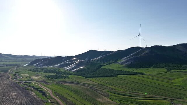 Aerial time-lapse view of photovoltaic power generation along the 100-mile Sky Road in Hebei Province