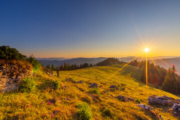 Fototapeta premium Sunset over the Mountains of Bukovina, Romania – Stunning Evening Sky and Landscape