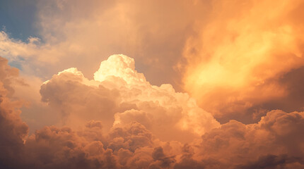 Dramatic golden hour clouds illuminated by sunlight creating a heavenly and majestic sky display