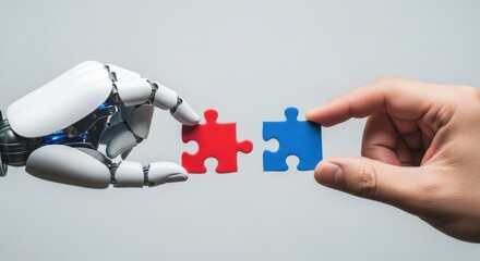 Close up of a robotic hand and a human hand holding two puzzle pieces together symbolizing collaboration and problem solving