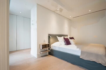 Modern luxury bedroom interior in minimal scandinavian style, 3d render