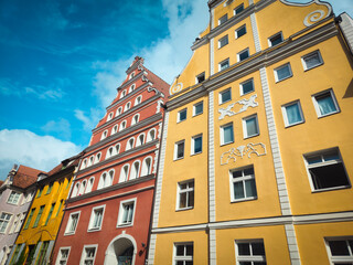 Narrow cobblestone alley with old brick walls, sunny light and shadow. Beautiful alleys and buildings in the old town of 18439 Stralsund