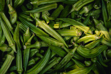 Fresh vegetables at small local urban market. Organic produce on sale at outdoor farmer market. Selling fresh crops and veggies harvest. European urban setting. Close up. Part of the series