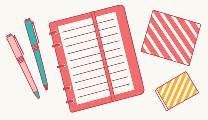 Overhead view of an open coral pink planner with two pens and two patterned sticky notes on a cream background