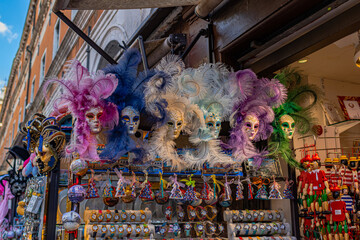 A photo of a display of masks and masks on a street