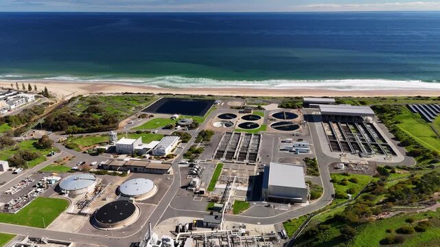 SA Water Christies Beach Wastewater Treatment Plant, O'Sullivan Beach, South Australia: 4K Aerial Drone Footage of Coastal Facility, Clarifier Tanks, Infrastructure, Solar Panels, and Nearby Beach