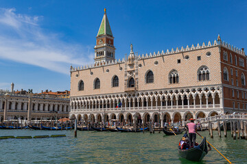 A photo of a large building with a clock on the top