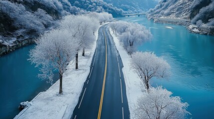 In winter, a road with rime crawling down on both sides, branches crawling down like a bow, the snow on the road forms a heart shape, the river is blue and turquoise
