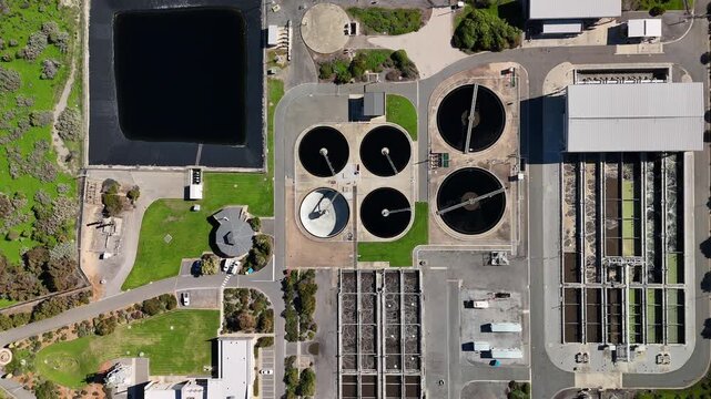 SA Water Christies Beach Wastewater Treatment Plant, O'Sullivan Beach, South Australia: 4K Aerial Drone Footage of Coastal Facility, Clarifier Tanks, Infrastructure, Solar Panels, and Nearby Beach