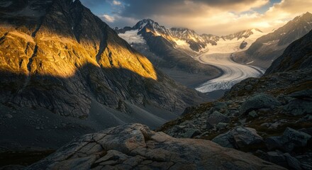 Obraz premium First Light on the Great Aletsch Glacier: A Dance of Golden Light and Shadow