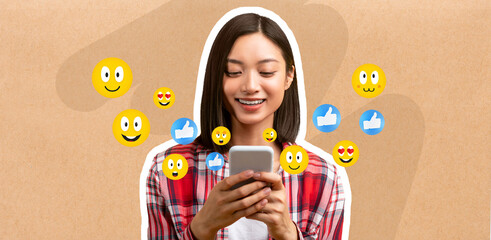Asian young woman in a plaid shirt enjoys texting on her smartphone, smiling as she connects with friends through social media. Emoticons float around her, reflecting her cheerful mood.