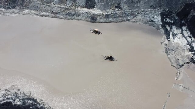 A mud suction tool in coal mining or slurry pump is sucking up the mud that is flooding the mining area, mud flood