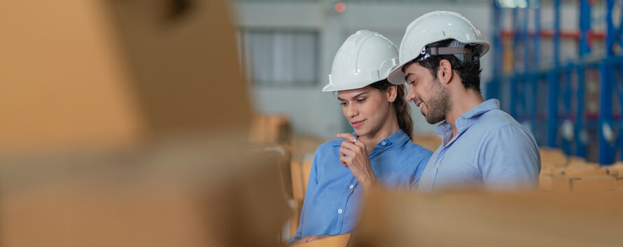 Warehouse worker working in warehouse storage. Foreman or worker work at factory site check up products in site. Inventory worker working in factory Storehouse