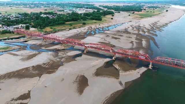 4K Aerial View Of Cagayan River Crossing, Buntun Bridge Connecting Tuguegarao City and Solana
a unique aerial perspective of the bridge as it spans the historic Cagayan River.