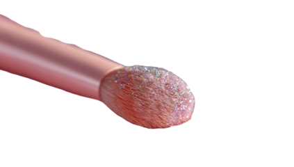 Close-up of a blush brush tip, rose gold color, covered in shimmering, light pink glitter